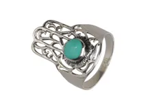 Anillo de plata 925 con una piedra turquesa redonda engarzada.