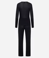Pijama largo Lov de dos piezas color negro, confeccionado en tejido flame con viscosa y elastano. Incluye una blusa de manga larga con escote en V cruzado y un pantalón de corte recto con cintura elástica.