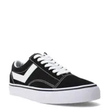 Championes urbanos Pony de corte bajo, confeccionados en una combinación de lona y gamuza en color negro. Presentan el diseño característico de la marca en los laterales en color blanco, cordones blancos y suela de goma vulcanizada blanca con una línea negra decorativa.