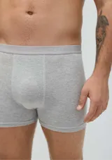 Pack de dos calzoncillos bóxer largos, uno negro y otro azul marino, confeccionados en algodón y elastano, con elástico personalizado en la cintura.