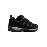 Championes de trekking Columbia modelo Redmond V2 Waterproof, color negro con detalles en gris. Confeccionados en malla y gamuza, con suela dentada de alta tracción y tecnología impermeable.