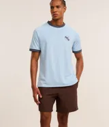 Bermuda deportiva Get Over de color beige, con cintura elástica, cordón ajustable contrastante, bolsillo trasero y pequeña estampa localizada.