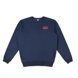 Buzo azul marino de corte clásico con cuello redondo y puños y cintura acanalados. Estampa pequeña con el logo de la marca en el pecho.