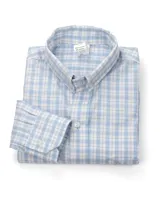 Camisa de hombre a cuadros rojos y blancos, de manga larga y corte clásico.