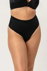Colaless de tiro alto color piel, confeccionada en lycra con faja abdominal de lycra reforzada y contención media.