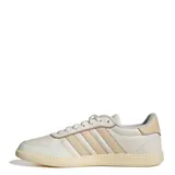 Championes Adidas Breaknet Sleek, color blanco hueso con tres franjas laterales en tono beige rosado. Diseño de corte bajo con suela de goma texturizada.