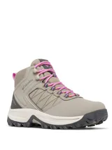 Bota de senderismo Columbia modelo Transverse Hike, color gris topo con detalles en rosa. Presenta una construcción impermeable con parte superior de cuero y malla, entresuela amortiguada y suela de goma con tracción avanzada.