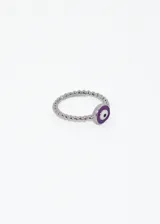 Anillo dorado con diseño de esferas y dije de ojo turco violeta, blanco y negro.