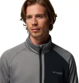 Campera polar Columbia Titanium de cuello alto y cierre frontal completo. Presenta un bolsillo en el pecho con cierre y panel de tela tejida, mangas largas con orificios para pulgares en los puños y ribetes elásticos en puños y dobladillo. Confeccionada con tecnología Omni-Wick para gestión de la humedad.