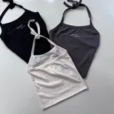 Top halter con tiras para atar al cuello, con logo bordado en el frente.