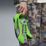 Championes urbanos Puma modelo H-Street OG, color verde flúo con detalles en plateado y negro. Presentan una estructura de malla transpirable, cordones negros y suela de goma con textura.