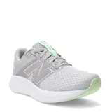 Championes de running New Balance modelo 460, color gris con detalles en verde claro. Presentan exterior de malla transpirable con refuerzos sintéticos, logo N lateral y entresuela blanca amortiguada.