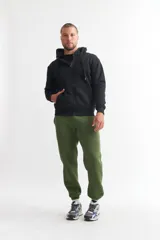 Pantalón de jogging verde militar de felpa, con cintura elástica y puños ajustados.