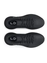 Championes Under Armour Lockdown 7 de color negro, diseñados para básquetbol. Presentan una parte superior de malla transpirable con superposiciones de cuero y película, entresuela de EVA y suela de caucho macizo con un patrón de tracción en blanco y negro. Incluyen el logo de la marca en el lateral.