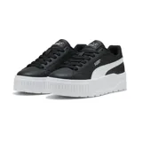 Championes Puma modelo Karmen II L, color blanco con plataforma alta, diseño urbano y detalles metalizados.