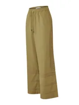 Pantalon de corte recto y tiro alto, confeccionado en una mezcla de lino orgánico y viscosa. Presenta cintura elástica con cordón ajustable y detalles de broderie tono a tono en los laterales y en el ruedo.