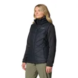 Chaleco Columbia Heavenly II de color negro, con diseño acolchado y tecnología termorreflectante Omni-Heat. Cuenta con cierre frontal de dos vías, cuello alto forrado y bolsillos laterales con cierre.