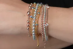 Pulsera de plata 925 con baño de oro rosa, compuesta por esferas pequeñas.