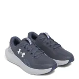 Championes Under Armour Charged Surge 4 color azul con detalles en blanco, ideales para running.
