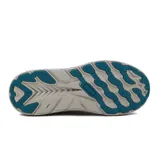Championes deportivos Diadora modelo Proton para mujer, color blanco con detalles en turquesa, amarillo neón y azul oscuro. Presentan una suela gruesa y texturizada en tonos gris y azul.