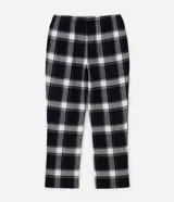 Pantalón de pijama de corte recto confeccionado en franela de algodón con estampado de cuadros en tonos blanco y negro. Presenta cintura elástica con cordón de ajuste para mayor comodidad.