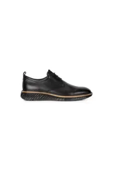 Zapato de vestir Ecco St.1 Hybrid de cuero negro con cordones, suela de goma y tecnología ECCO FLUIDFORM™ Direct Comfort.