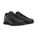Zapatillas Reebok Classic Leather negras de cuero, con logo de la marca en el lateral y detalles en rojo.