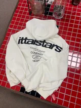Hoodie de color blanco con capucha, diseño de corte holgado y estampado gráfico en la espalda con tipografía negra.
