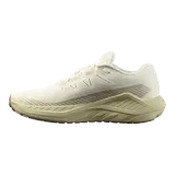 Championes Salomon DRX Defy Grvl de running y trail, en color beige y tostado, diseñados con tejido de malla transpirable, tecnología Active Chassis y suela con tacos para mayor tracción en superficies mixtas.