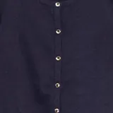 Cárdigan azul marino de punto liso con cuello redondo y cierre frontal con botones.