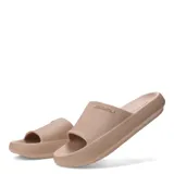Chanclas de goma color beige de suela gruesa y diseño slide con textura en relieve y logo de la marca en la tira.