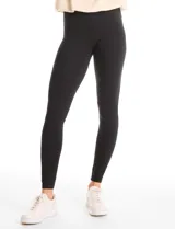Legging de tiro alto confeccionada en algodón elástico con cintura ancha modeladora. Presenta un calce ajustado y tejido opaco de tacto natural.
