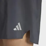 Short de running Adidas Adi365 Essentials, color gris, con cintura elástica, cordones de ajuste y calzoncillo interior de malla. Incorpora un bolsillo trasero con cierre y logo reflectivo.