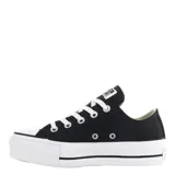 Championes Converse modelo Chuck Taylor Lift de caña baja, con capellada de material sintético negro y suela de plataforma blanca con franjas negras. Presenta cordones blancos y puntera de goma clásica.