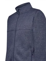 Campera polar azul jaspeado con cierre frontal completo, cuello alto y bolsillos laterales con cierre.