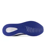 Championes New Balance Lowky para hombre, color lila con detalles en verde neón y azul.