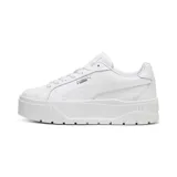 Championes de plataforma Puma Karmen II L, color blanco, con suela chunky texturizada, cordones tono sobre tono y detalles de la marca en plateado en el lateral.
