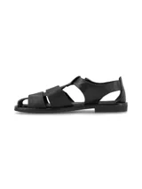 Sandalias de cuero color negro, de estilo romano con tiras cruzadas en el empeine, hebilla metálica de ajuste lateral y suela plana.