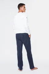 Pantalón deportivo azul marino de felpa de algodón con corte recto.