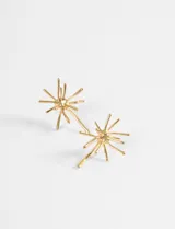 Par de aros de acero quirúrgico con diseño de estrella radiante de múltiples puntas.