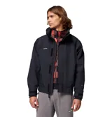 Campera impermeable Columbia Bugaboo II 1986 de color negro, con cuello alto, cierre frontal con solapa, bolsillos con cierre y puños ajustables con velcro. Cuenta con tecnología Omni-Tech y logo de la marca bordado en el pecho.