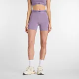 Short deportivo ajustado de tiro alto, color lila, con cintura elástica ancha que incluye el logo de la marca. Confeccionado en tejido elástico con tecnología de secado rápido.