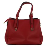 Cartera negra con correa larga y corta, y monedero a juego.