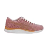 Championes de running Asics Streetwise, color negro con detalles en cobre y suela blanca. Diseño de malla transpirable con el logo característico de la marca en los laterales.
