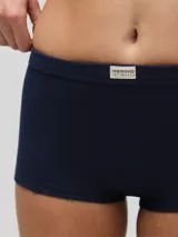 Bombacha tipo bóxer de algodón color azul marino con cintura elástica y logo de la marca en el centro.