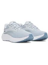 Championes de running Under Armour W Ascend, color celeste con suela blanca y detalles en azul marino. Parte superior de malla transpirable con refuerzos sintéticos y amortiguación Charged+.