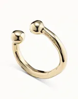 Pulsera rígida bañada en plata, con diseño abierto y terminaciones en forma de bola en cada extremo.