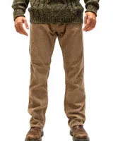 Pantalón de corte clásico confeccionado en pana gruesa color beige, con diseño de cinco bolsillos y textura acanalada.