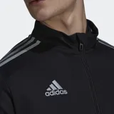 Campera Adidas de hombre, color negro con detalles reflectantes y tres rayas plateadas en los hombros. Cuenta con bolsillos con cierre, cuello alto y tecnología Aeroready.