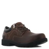 Zapatos casuales de hombre marca Branch, confeccionados en cuero color marrón chocolate. Presentan un diseño robusto con cordones, cuello acolchado en color negro y suela de goma dentada para mayor tracción.